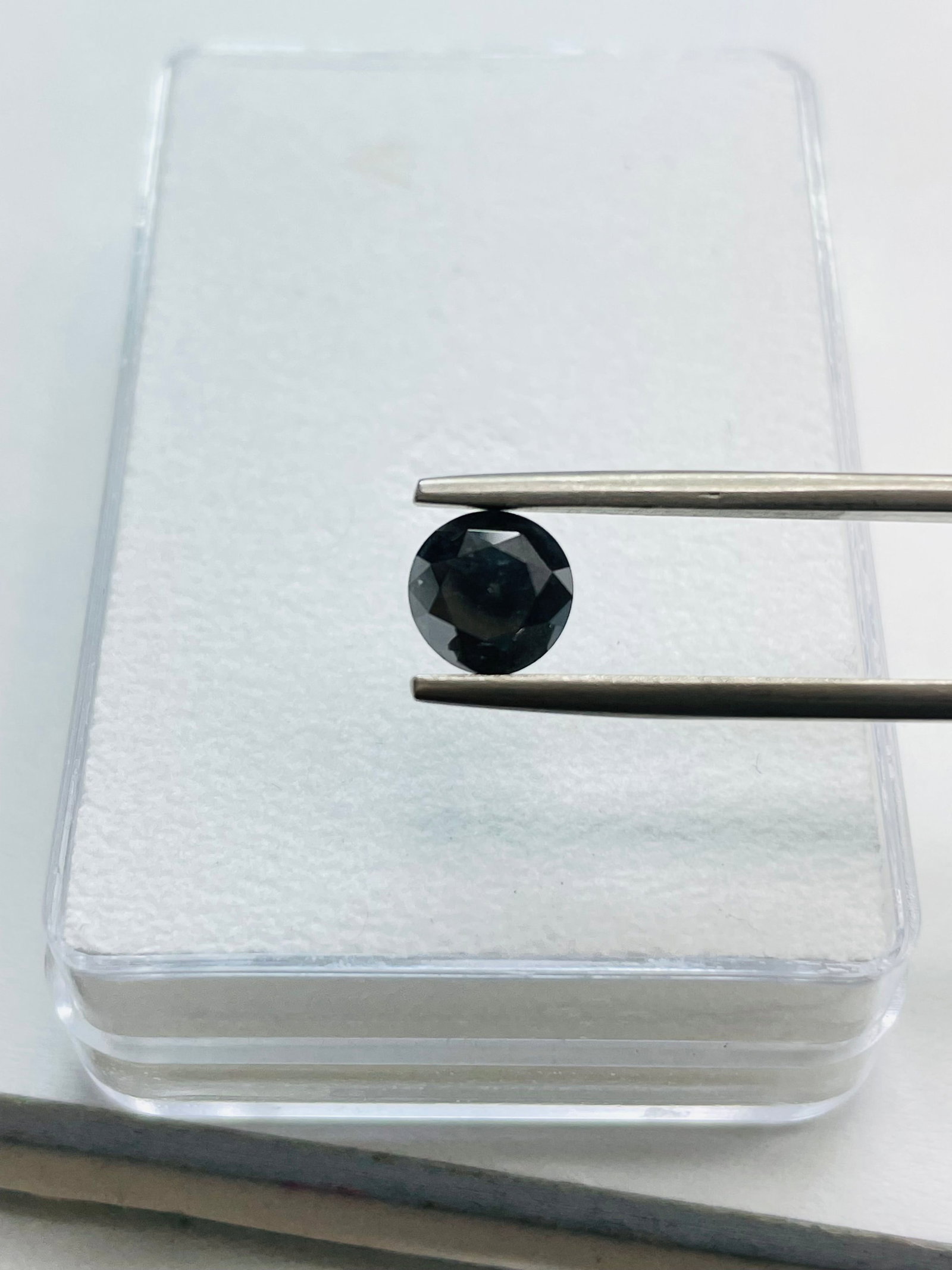 Loose Diamond - ROUND 1.47ct Fancy Black: Loose Diamond - ROUND 1.47ct Fancy Black Source: Natural Shape: ROUND Carats: 1.47 Color: Fancy Black Certification: GIA The Diamond Depot Guarantee: All items in this auction are guaranteed to be 100