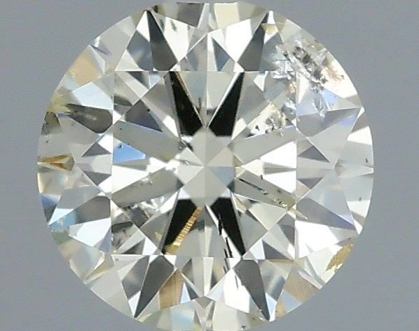Loose Diamond - ROUND 0.52ct S-T I1: Loose Diamond - ROUND 0.52ct S-T I1 Source: Natural Shape: ROUND Carats: 0.52 Color: S-T Certification: IGI Video: