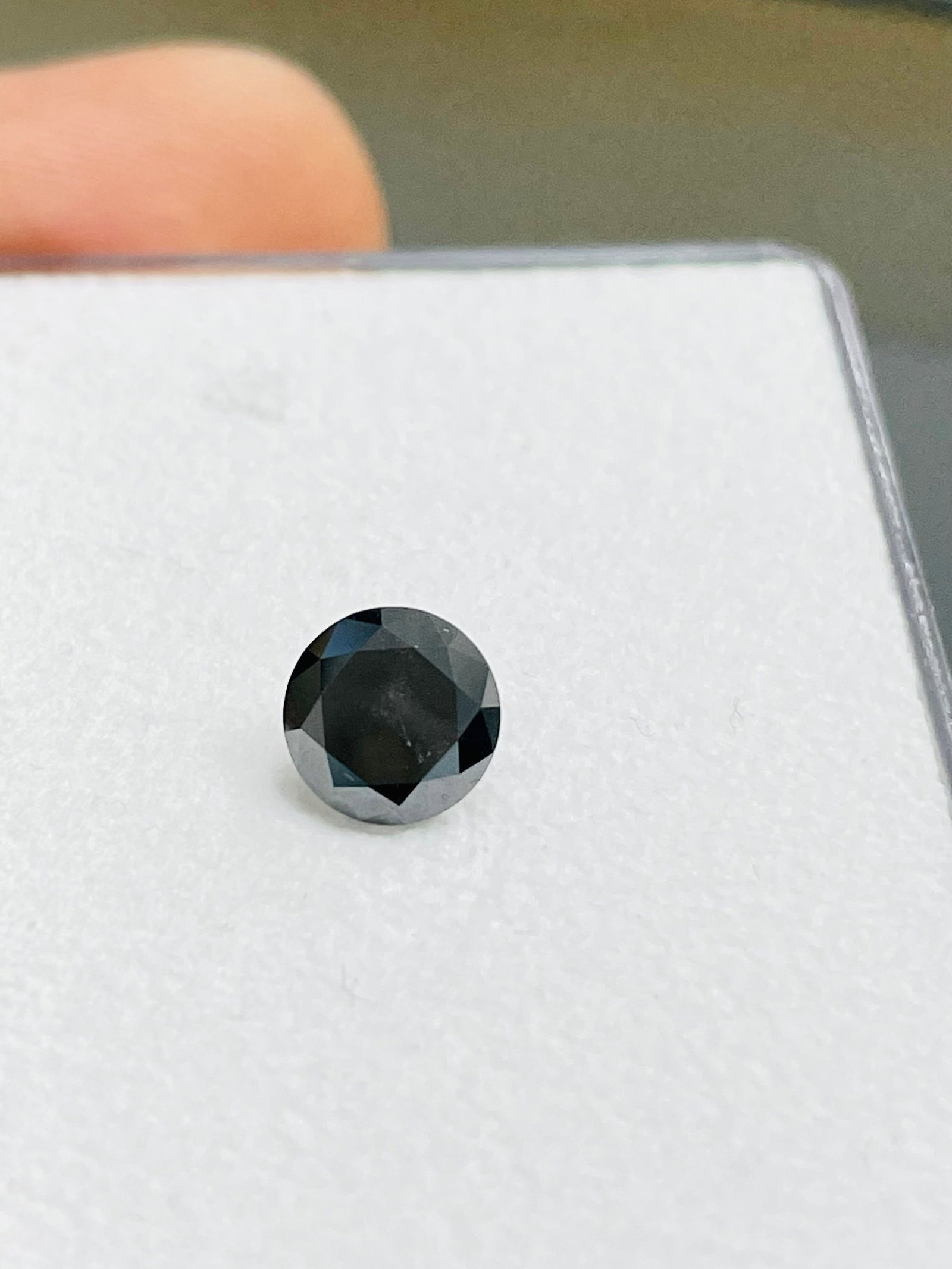 Loose Diamond - ROUND 1.46ct Fancy Black: Loose Diamond - ROUND 1.46ct Fancy Black Source: Natural Shape: ROUND Carats: 1.46 Color: Fancy Black Certification: GIA The Diamond Depot Guarantee: All items in this auction are guaranteed to be 100
