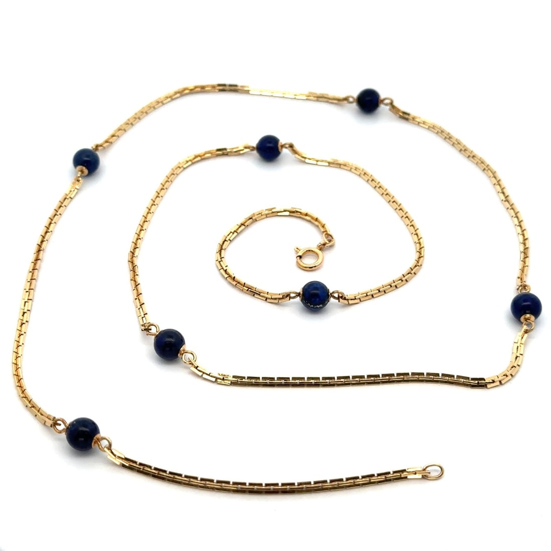Tiffany 14k Yellow Gold Lapis Lazuli Bead Station Chain Necklace 30 Inch Vintage: Tiffany 14k Yellow Gold Lapis Lazuli Bead Station Chain Necklace 30 Inch Vintage This vintage Tiffany & Co. necklace features a 30-inch long fancy square interlocking link chain crafted from 14k solid