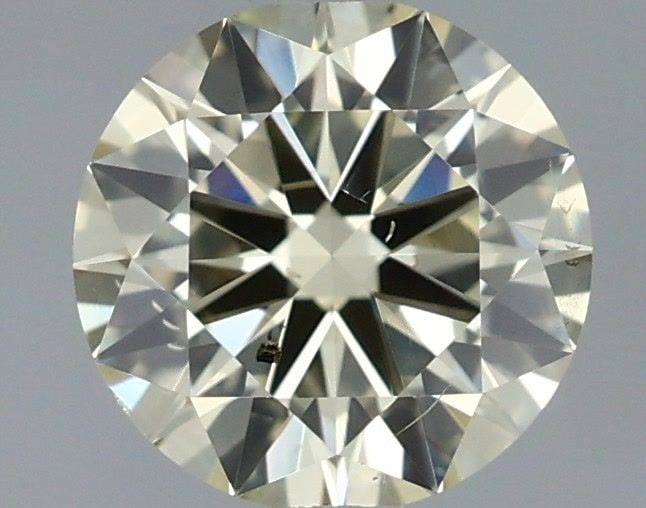 Loose Diamond - ROUND 0.71ct U-V SI2: Loose Diamond - ROUND 0.71ct U-V SI2 Source: Natural Shape: ROUND Carats: 0.71 Color: U-V Certification: IGI Video: