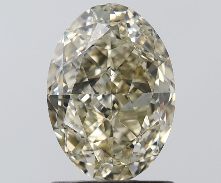 Loose Diamond - OVAL 1.53ct Fancy Light Yellow VS1: Loose Diamond - OVAL 1.53ct Fancy Light Yellow VS1 Source: Natural Shape: OVAL Carats: 1.53 Color: Fancy Light Yellow Certification: GIA The Diamond Depot Guarantee: All items in this auction are guar