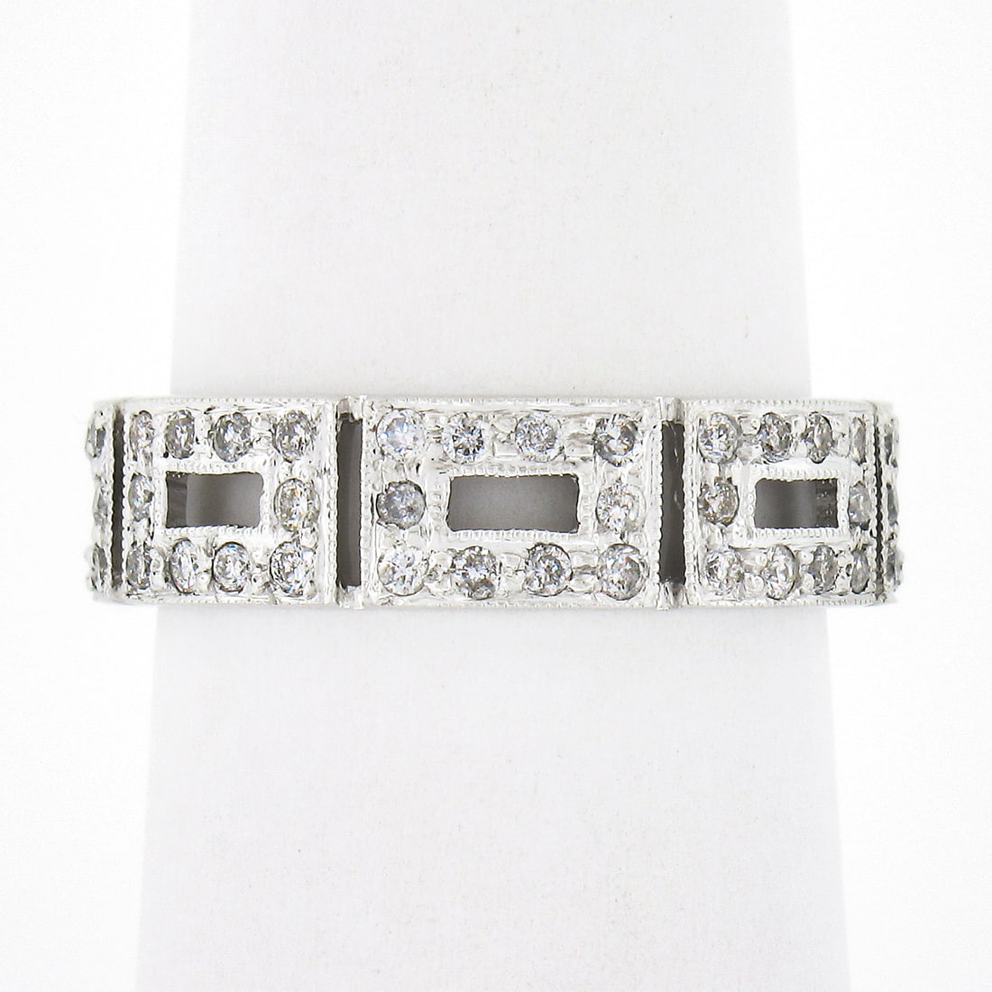14k White Gold 0.87ctw Pave Set Diamond Band Ring: 14k White Gold 0.87ctw Pave Set Diamond Band Ring This stunning 14k White Gold Near Eternity Band Ring features a remarkable pave setting adorned with approximately 0.87 carats of natural round brilli