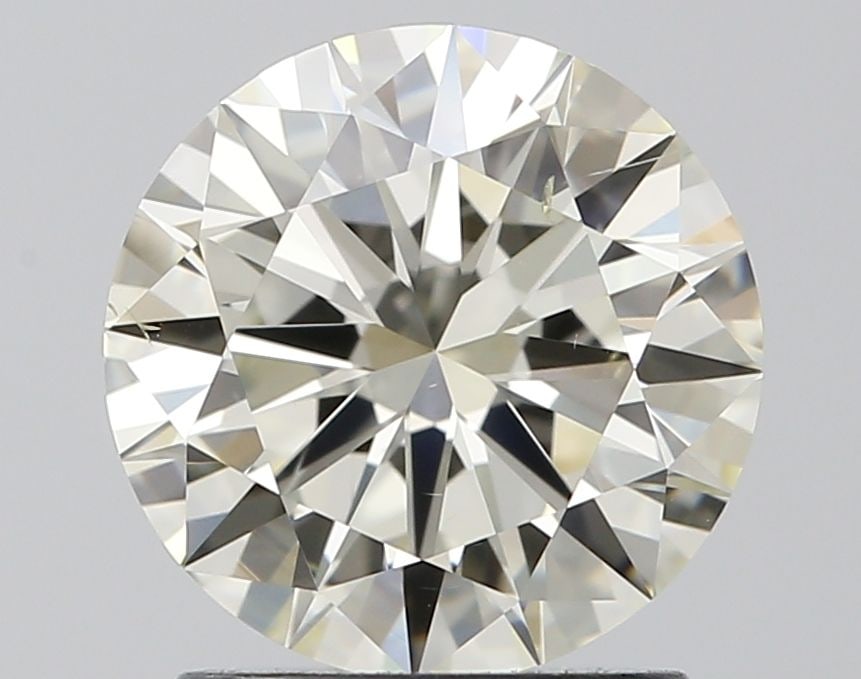 Loose Diamond - ROUND 1.56ct J SI1: Loose Diamond - ROUND 1.56ct J SI1 Source: Natural Shape: ROUND Carats: 1.56 Color: J Clarity: SI1 Certification: IGI Video:
