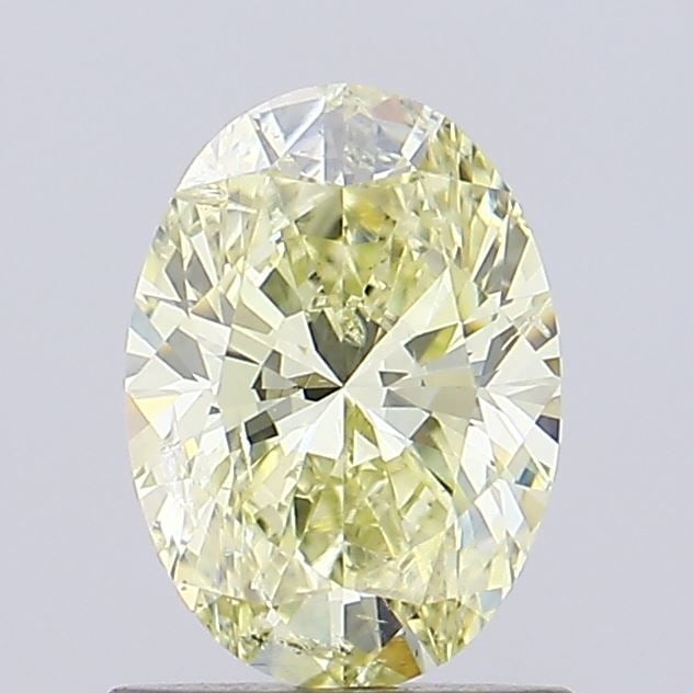 Loose Diamond - OVAL 1.0ct Fancy Vivid Yellow SI2: Loose Diamond - OVAL 1.0ct Fancy Vivid Yellow SI2 Source: Natural Shape: OVAL Carats: 1.0 Color: Fancy Vivid Yellow Certification: NONE Video: