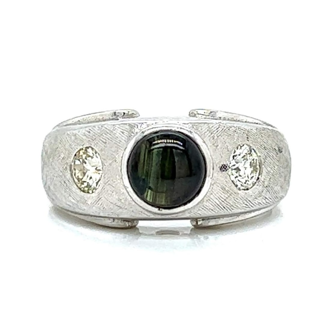 14K White Gold Star Sapphire Diamond Ring 1.50 Ct with 2 Diamonds: 14K White Gold Star Sapphire Diamond Ring 1.50 Ct with 2 Diamonds This stunning ring features a captivating star sapphire set in luxurious 14K white gold. The centerpiece is approximately 1.50 Ct. of 
