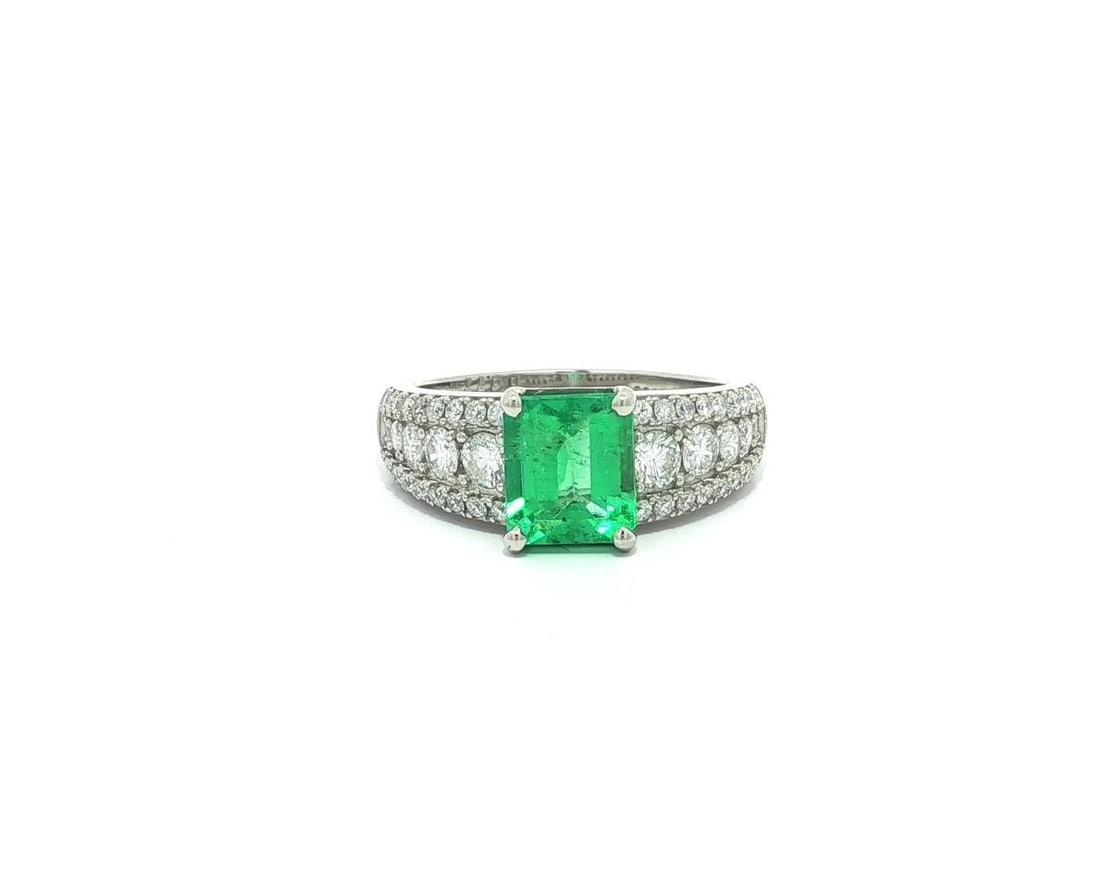 Platinum GIA Certified 2.15ct Colombian Emerald and Diamond Shoulders Ring: Platinum GIA Certified 2.15ct Colombian Emerald and Diamond Shoulders Ring This exquisite cocktail ring showcases a stunning natural Colombian emerald, expertly crafted with an octagonal step cut and 
