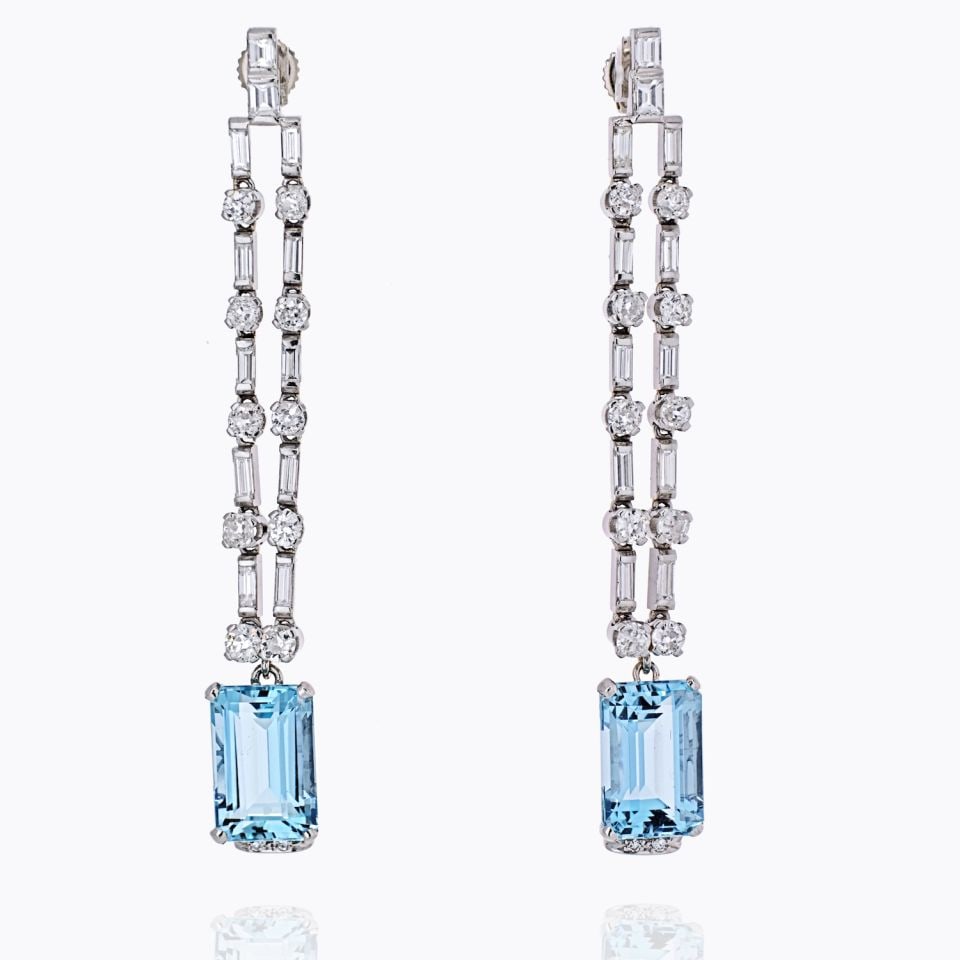 Elegant Platinum Diamond Aquamarine Cascade Earrings 7.5 Cts: Elegant Platinum Diamond Aquamarine Cascade Earrings 7.5 Cts These exquisite platinum diamond and aquamarine cascade dangling earrings are the perfect blend of elegance and sophistication. Featuring a