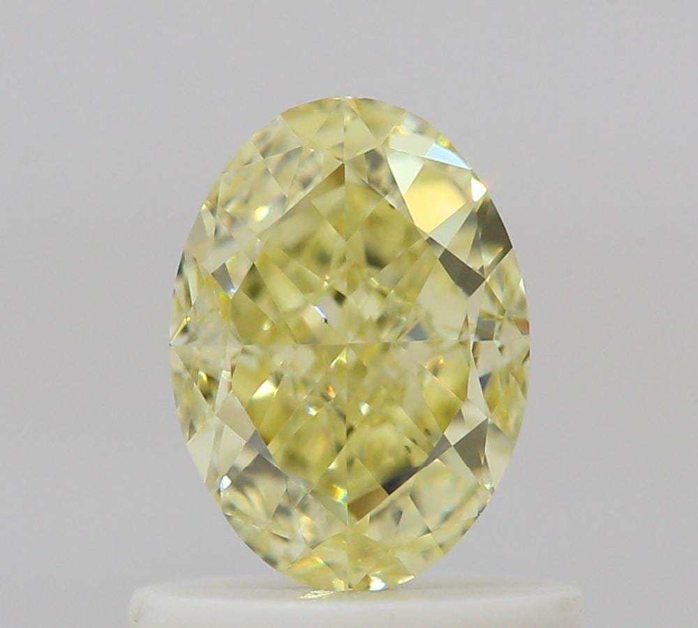 Loose Diamond - OVAL 0.84ct Fancy Yellow VS2: Loose Diamond - OVAL 0.84ct Fancy Yellow VS2 Source: Natural Shape: OVAL Carats: 0.84 Color: Fancy Yellow Certification: GIA Video: