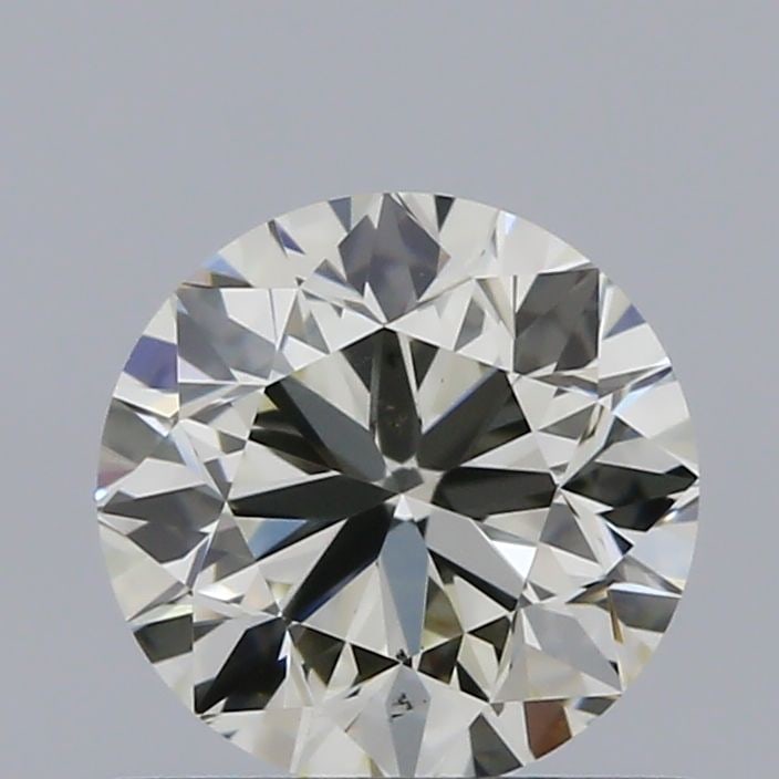 Loose Diamond - ROUND 0.7ct K VS2: Loose Diamond - ROUND 0.7ct K VS2 Source: Natural Shape: ROUND Carats: 0.7 Color: K Clarity: VS2 Certification: IGI Video:
