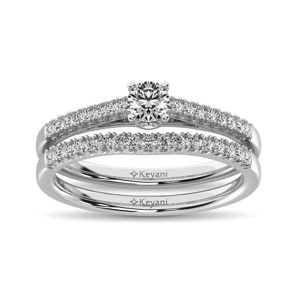 Diamond 1/2 Ct.Tw. Bridal Ring in 14K White Gold: Diamond 1/2 Ct.Tw. Bridal Ring in 14K White Gold 14k White Gold Stone Color: G-h Stone Clarity: Si2 Each ring is presented in standard size 6.5. Complimentary resizing is available between sizes 510 (