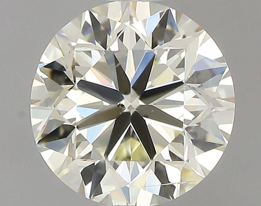 Loose Diamond - ROUND 0.9ct M SI1: Loose Diamond - ROUND 0.9ct M SI1 Source: Natural Shape: ROUND Carats: 0.9 Color: M Clarity: SI1 Certification: IGI Video:
