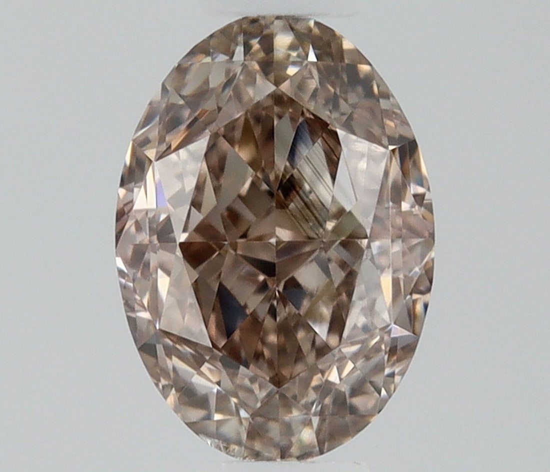 Loose Diamond - OVAL 0.5ct Fancy Orangey Brown SI1: Loose Diamond - OVAL 0.5ct Fancy Orangey Brown SI1 Source: Natural Shape: OVAL Carats: 0.5 Color: Fancy Orangey Brown Certification: GIA Video: