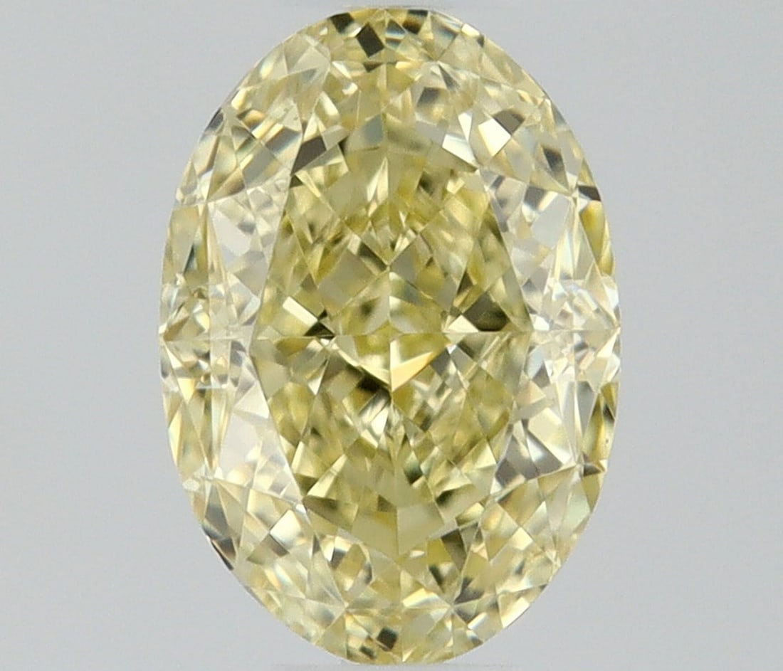 Loose Diamond - OVAL 0.4ct Fancy Light Yellow VVS2: Loose Diamond - OVAL 0.4ct Fancy Light Yellow VVS2 Source: Natural Shape: OVAL Carats: 0.4 Color: Fancy Light Yellow Certification: NONE Video: