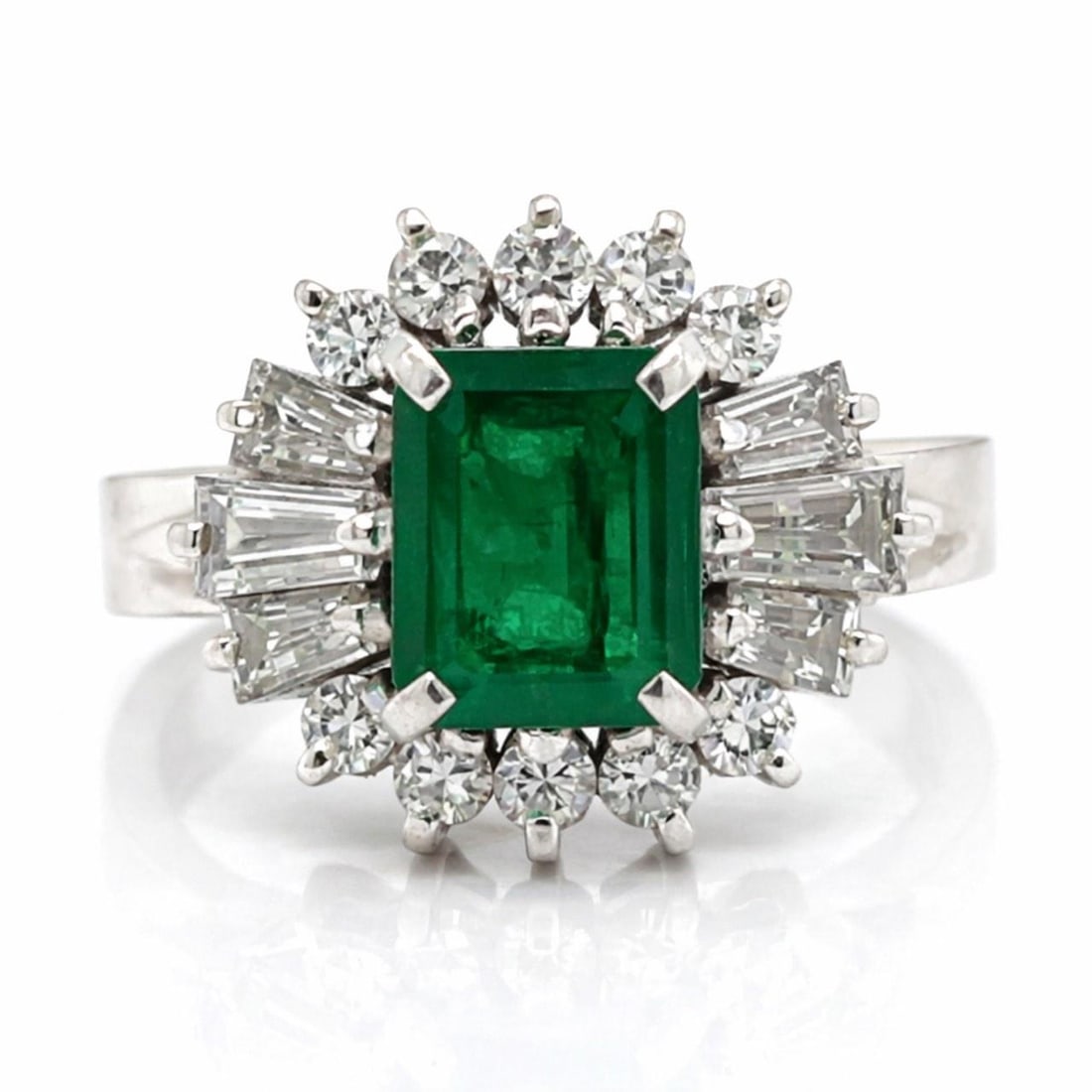 Emerald and Diamond Platinum Ring with 0.85 Ct Emerald Size 5.25: Emerald and Diamond Platinum Ring with 0.85 Ct Emerald Size 5.25 This platinum ring features an approximately 0.85 carat emerald as the centerpiece, complemented by 16 diamonds totaling 0.72 carats wi