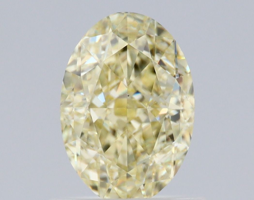 Loose Diamond - OVAL 1.02ct Fancy Light Yellow VS2: Loose Diamond - OVAL 1.02ct Fancy Light Yellow VS2 Source: Natural Shape: OVAL Carats: 1.02 Color: Fancy Light Yellow Certification: GIA Video: