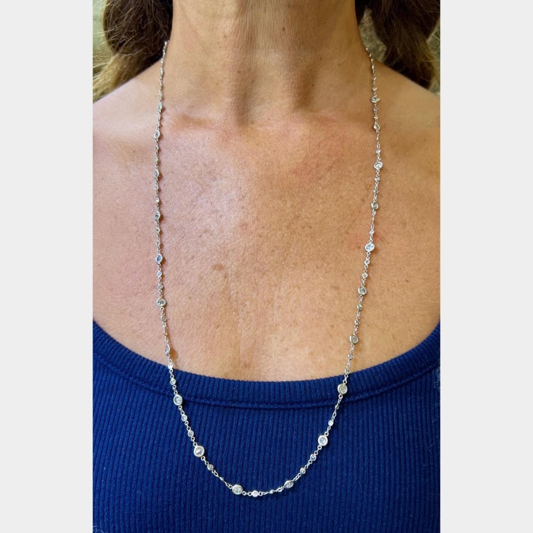 Platinum 9.00 Ct Diamond by the Yard Necklace 28 Inches: Platinum 9.00 Ct Diamond by the Yard Necklace 28 Inches Elevate your jewelry collection with this stunning Platinum Diamond by the Yard Necklace, featuring a total diamond weight of 9.00 Ct. This exqu