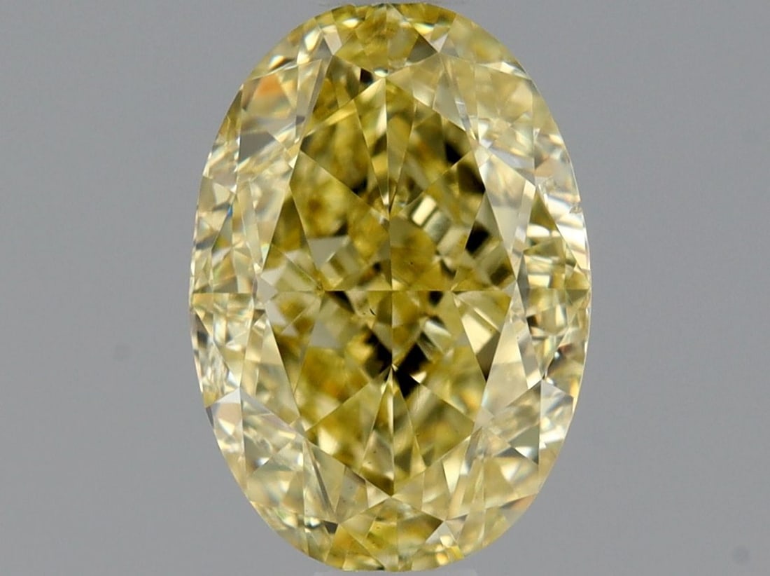 Loose Diamond - OVAL 1.01ct Fancy Yellow SI1: Loose Diamond - OVAL 1.01ct Fancy Yellow SI1 Source: Natural Shape: OVAL Carats: 1.01 Color: Fancy Yellow Certification: GIA Video: