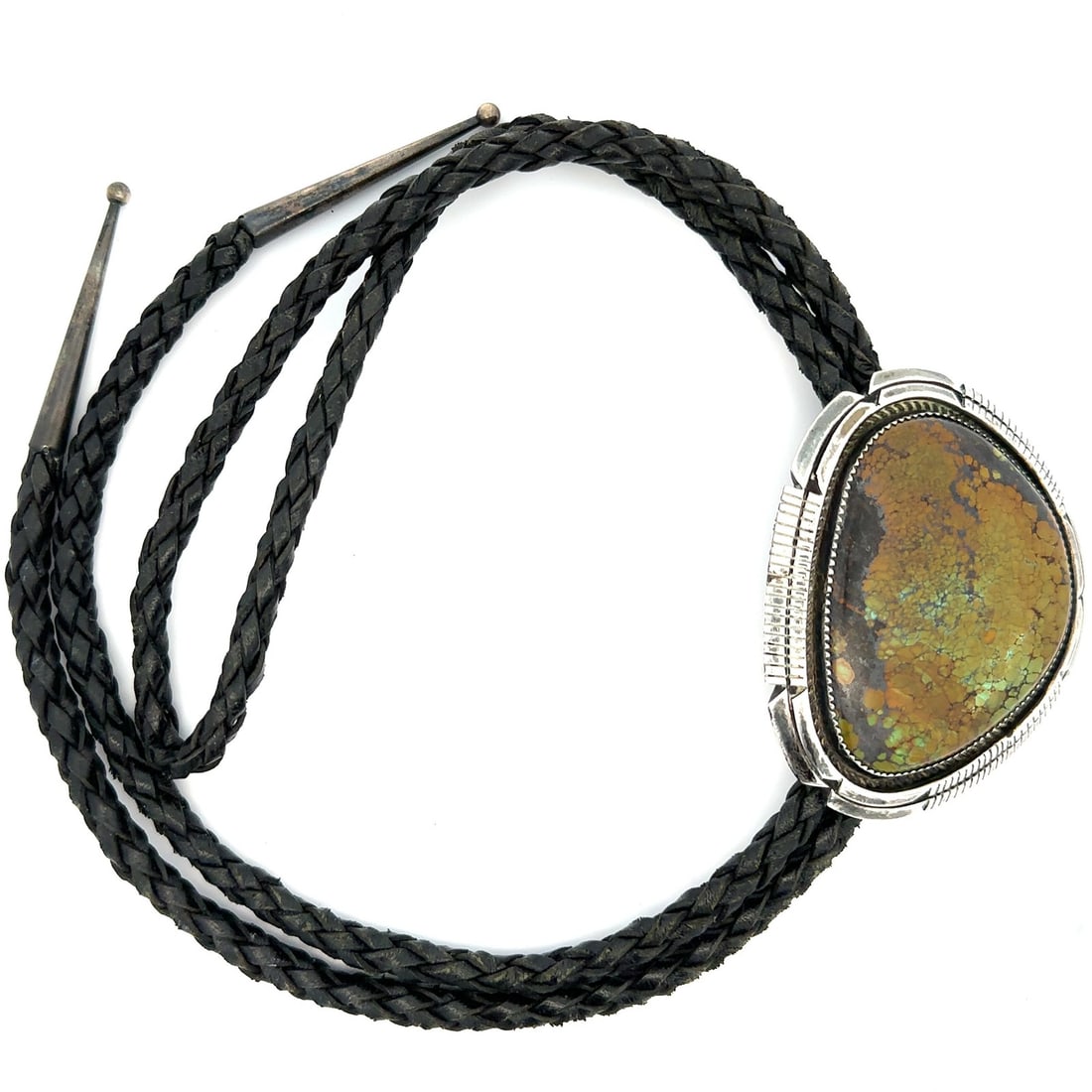 Sterling Silver Navajo Bolo Tie by Bernice Bonney with Green Turquoise Cabochon: Sterling Silver Navajo Bolo Tie by Bernice Bonney with Green Turquoise Cabochon This vintage Navajo bolo tie, crafted by Bernice Bonney, features a striking natural green turquoise cabochon set in ste