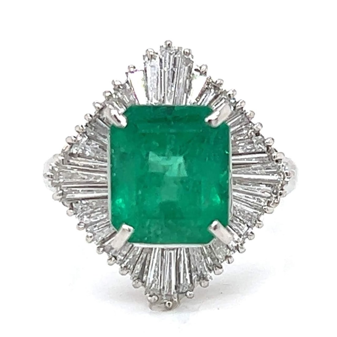 Platinum 3.18 Ct Emerald Diamond Ring 1.62 Ct Baguette E-F VVS-VS: Platinum 3.18 Ct Emerald Diamond Ring 1.62 Ct Baguette E-F VVS-VS This exquisite ring features a stunning 3.18 Ct. emerald at its center, beautifully complemented by 1.62 Ct. of baguette diamonds. Cra