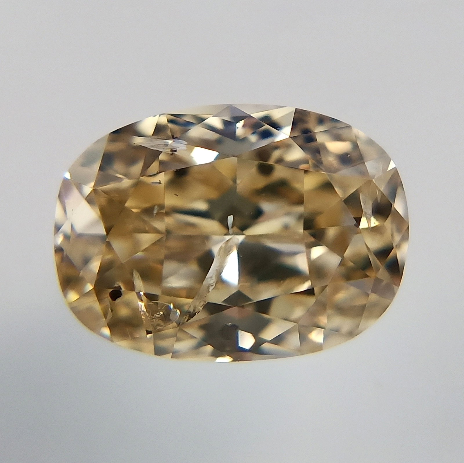 Loose Diamond - OVAL 1.01ct Fancy Yellow Brown: Loose Diamond - OVAL 1.01ct Fancy Yellow Brown Source: Natural Shape: OVAL Carats: 1.01 Color: Fancy Yellow Brown Certification: GIA The Diamond Depot Guarantee: All items in this auction are guarante