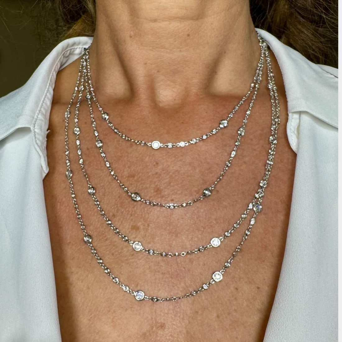 18K White Gold 16 Ct Diamond by the Yard Necklace 82 Inches: 18K White Gold 16 Ct Diamond by the Yard Necklace 82 Inches This stunning Diamond by the Yard necklace features a luxurious design crafted in 18K white gold. The necklace is adorned with a total of 30