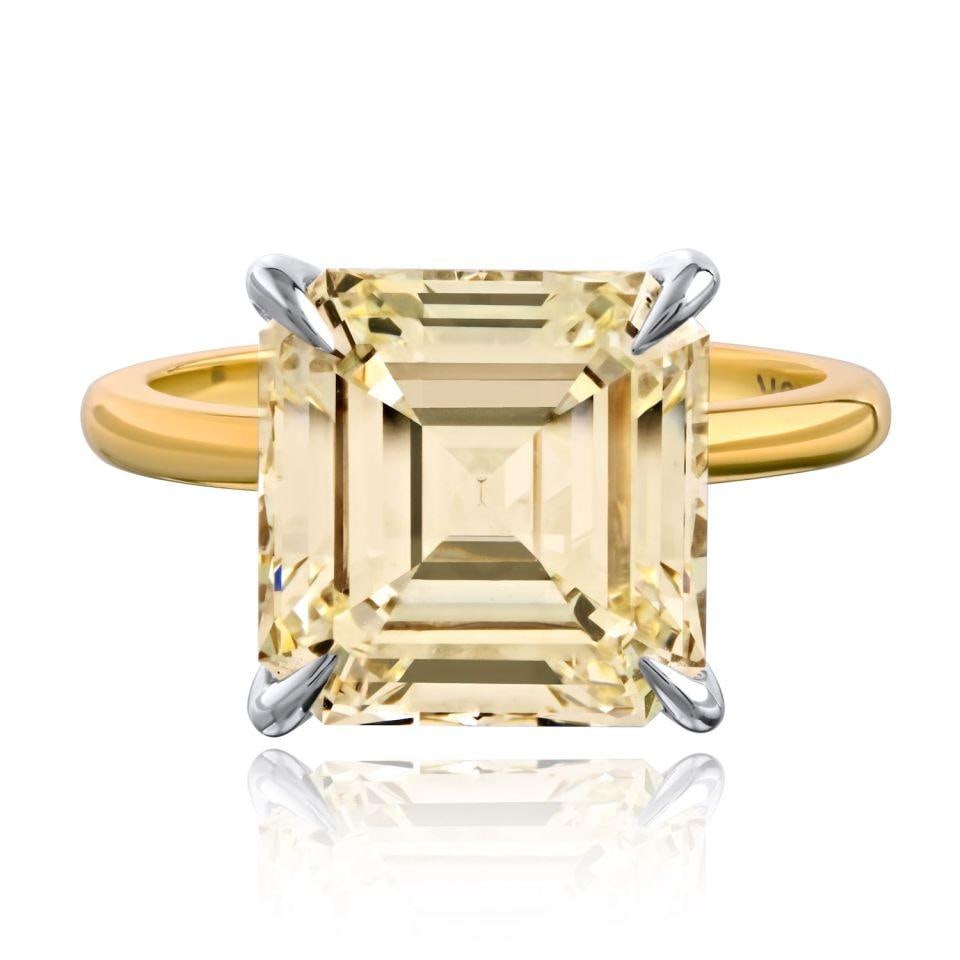 Emerald Cut 5.24ct L VS1 Diamond GIA Certified Two Tone Engagement Ring: Emerald Cut 5.24ct L VS1 Diamond GIA Certified Two Tone Engagement Ring This pre-owned engagement ring features a 5.24 carat square emerald cut diamond certified by GIA with L color and VS1 clarity. T