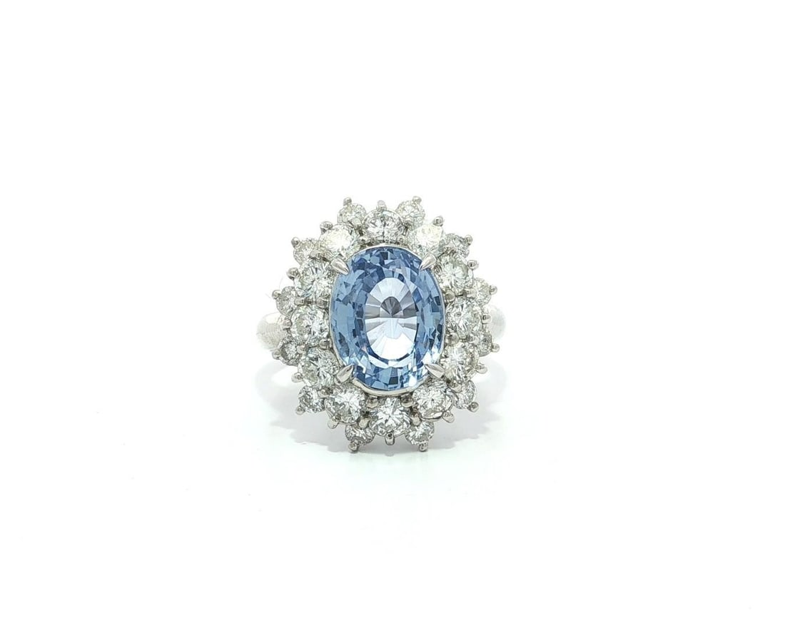 Platinum GIA Certified 5.98ct No Heat Ceylon Sapphire Dual Halo Ring: Platinum GIA Certified 5.98ct No Heat Ceylon Sapphire Dual Halo Ring This exquisite cocktail ring features a stunning 4.23ct natural Ceylon sapphire at its center, showcasing a beautiful cornflower bl