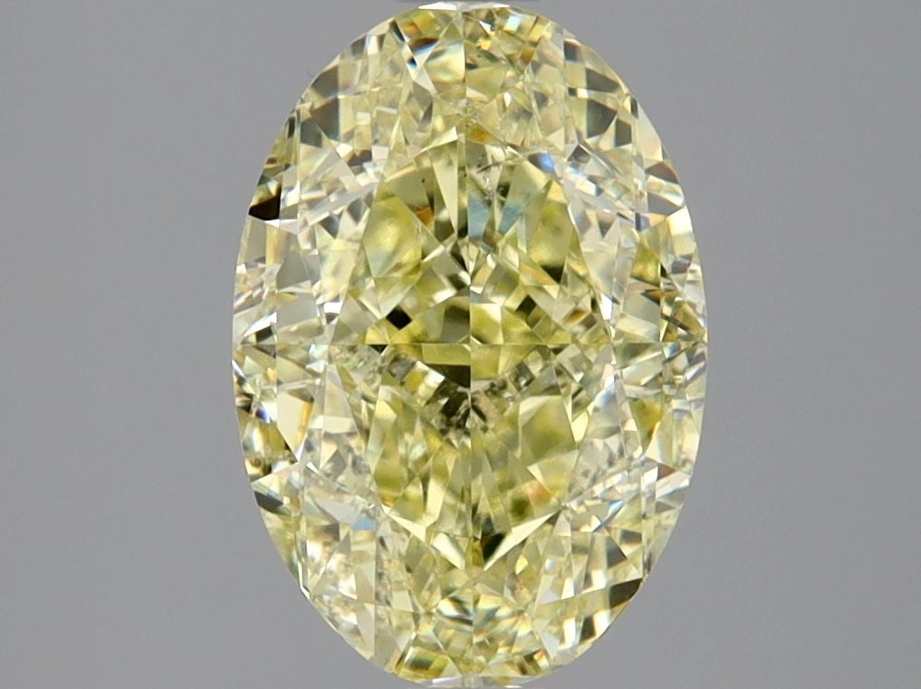 Loose Diamond - OVAL 2.73ct Fancy SI1: Loose Diamond - OVAL 2.73ct Fancy SI1 Source: Natural Shape: OVAL Carats: 2.73 Color: Fancy Certification: GIA Video: Video Link The Diamond Depot Guarantee: All items in this auction are guaranteed