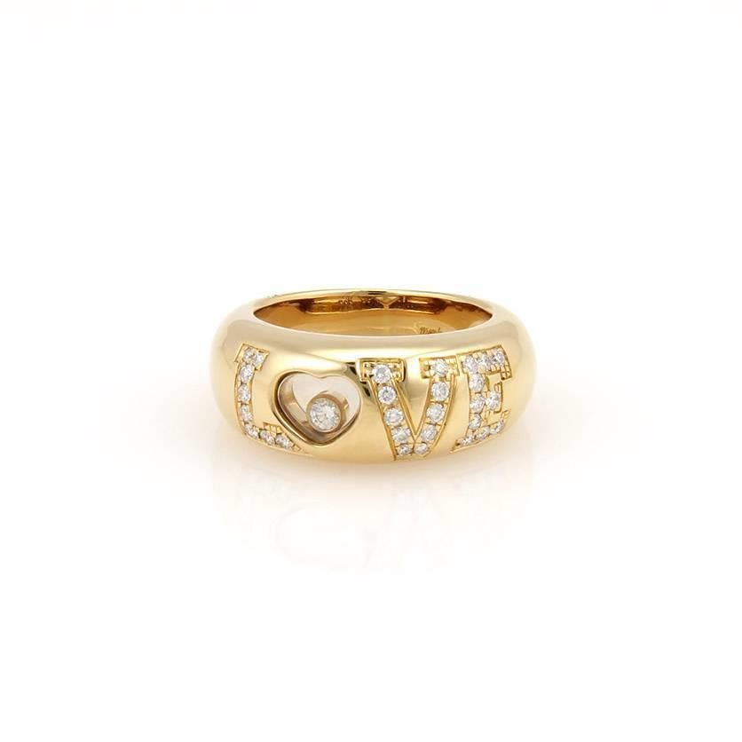 Chopard Happy Diamond Love Ring 18k Yellow Gold Size 6: Chopard Happy Diamond Love Ring 18k Yellow Gold Size 6 This exquisite Chopard Love Ring from the Happy Diamond Collection is a stunning piece crafted from 18k yellow gold. The ring features a high dom