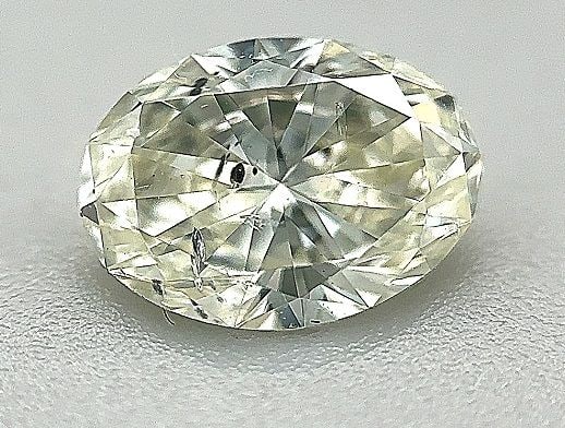 Loose Diamond - OVAL 1.0ct J SI2: Loose Diamond - OVAL 1.0ct J SI2 Source: Natural Shape: OVAL Carats: 1.0 Color: J Clarity: SI2 Certification: IGI The Diamond Depot Guarantee: All items in this auction are guaranteed to be 100% authe