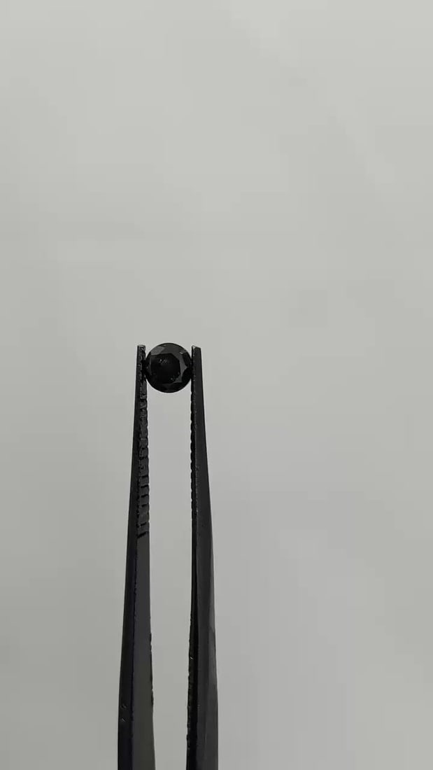 Loose Diamond - ROUND 0.4ct Fancy Black VVS2: Loose Diamond - ROUND 0.4ct Fancy Black VVS2 Source: Natural Shape: ROUND Carats: 0.4 Color: Fancy Black Certification: GIA Video: