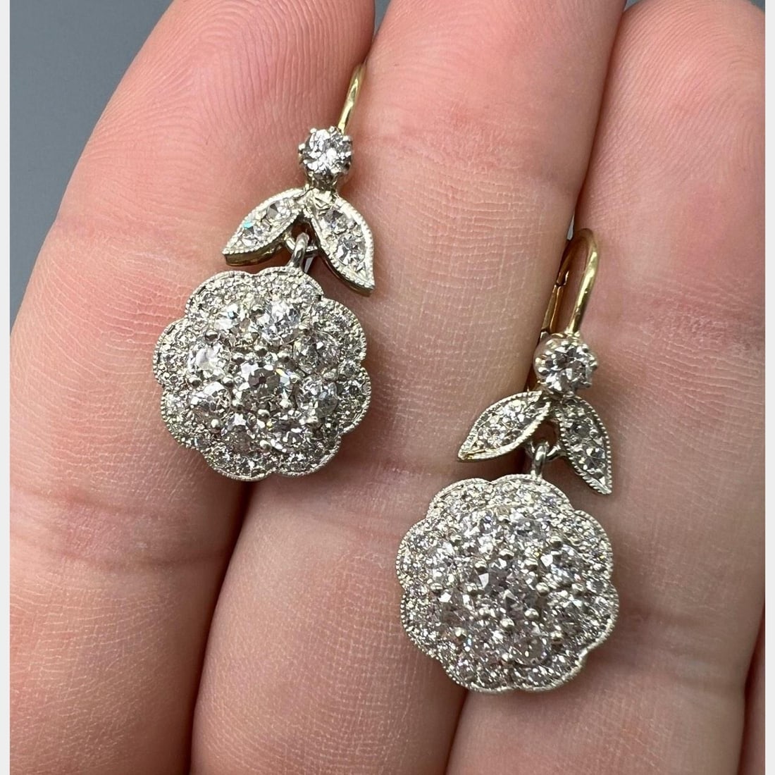 Diamond Drop Earrings 4.20 Carats in 18K Gold and Silver Top: Diamond Drop Earrings 4.20 Carats in 18K Gold and Silver Top These earrings feature approximately 4.20 carats of diamonds, set in 18K yellow gold with a silver top. The diamonds are F-H color and VS1-