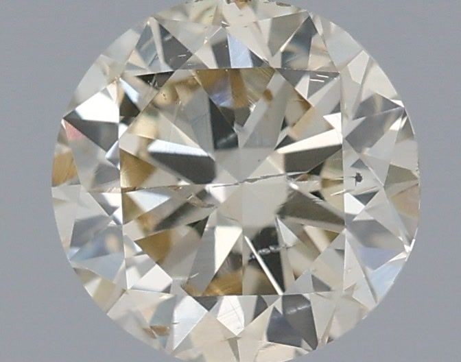 Loose Diamond - ROUND 0.9ct L SI2: Loose Diamond - ROUND 0.9ct L SI2 Source: Natural Shape: ROUND Carats: 0.9 Color: L Clarity: SI2 Certification: IGI Video: Video Link The Diamond Depot Guarantee: All items in this auction are