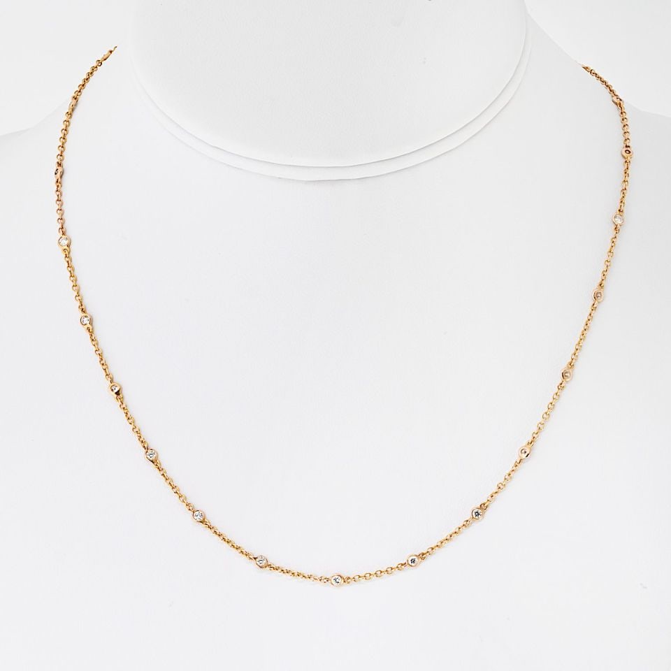 Tiffany & Co. 18K Rose Gold Diamonds by the Yard Necklace 0.68 Cts: Tiffany & Co. 18K Rose Gold Diamonds by the Yard Necklace 0.68 Cts This exquisite Tiffany & Co. 18K Rose Gold Diamond By The Yard Necklace is a timeless accessory that adds a touch of elegance to any 