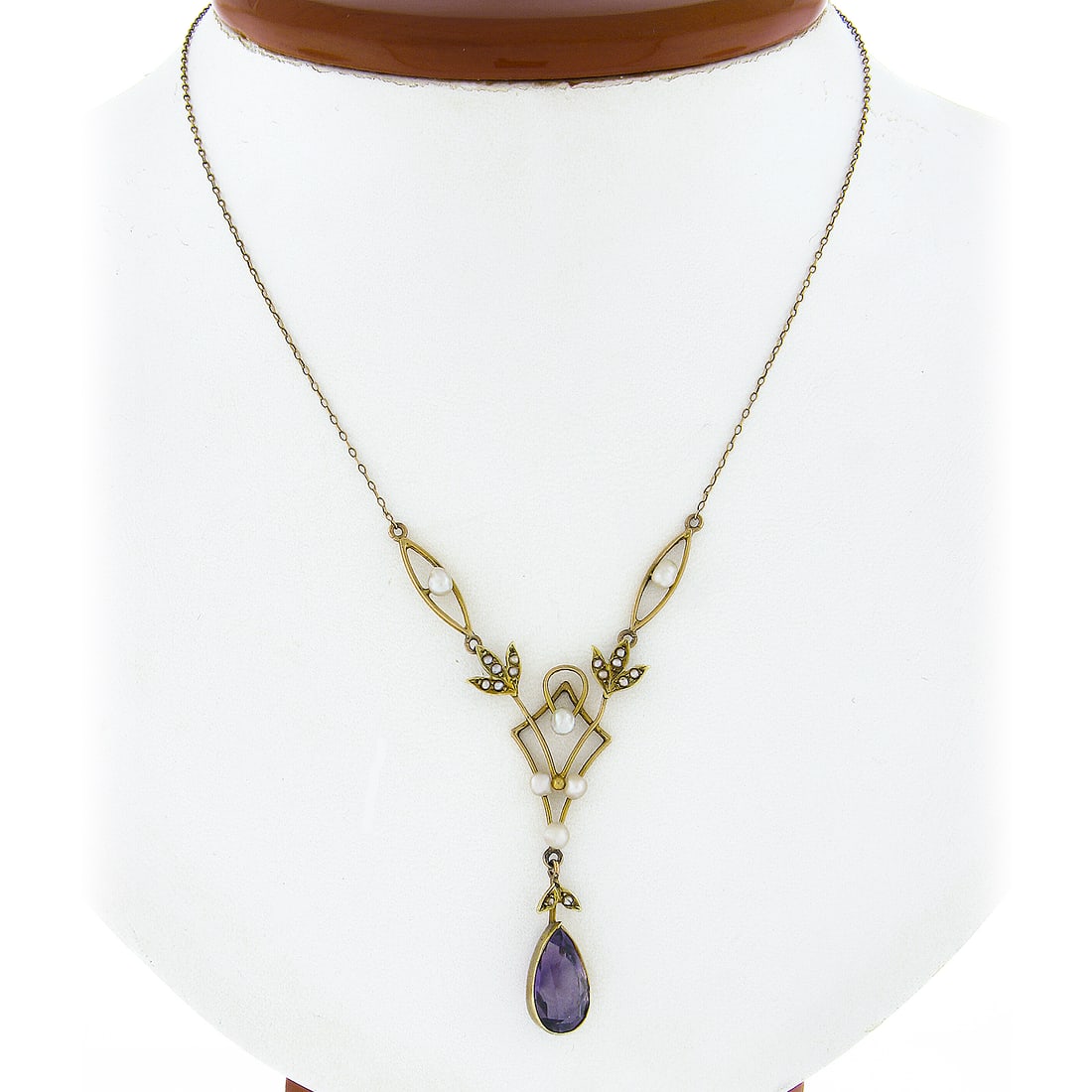 Antique Victorian 14k Gold Dangle Lavalier Necklace with Amethyst and Seed Pearls: Antique Victorian 14k Gold Dangle Lavalier Necklace with Amethyst and Seed Pearls Discover the elegance of this Antique Victorian Dangle Lavalier Necklace, crafted from solid 14k yellow gold. Featurin