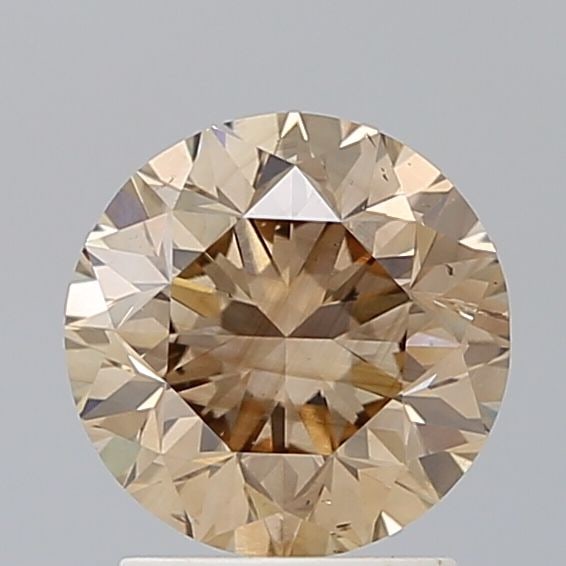 Loose Diamond - ROUND 2.13ct Fancy Brown SI1: Loose Diamond - ROUND 2.13ct Fancy Brown SI1 Source: Natural Shape: ROUND Carats: 2.13 Color: Fancy Brown Certification: NONE The Diamond Depot Guarantee: All items in this auction are guaranteed to b