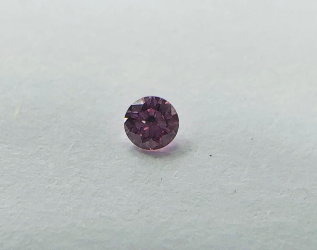 Loose Diamond - ROUND 0.06ct Fancy Intense Purplish Pink: Loose Diamond - ROUND 0.06ct Fancy Intense Purplish Pink Source: Natural Shape: ROUND Carats: 0.06 Color: Fancy Intense Purplish Pink Certification: GIA Video: