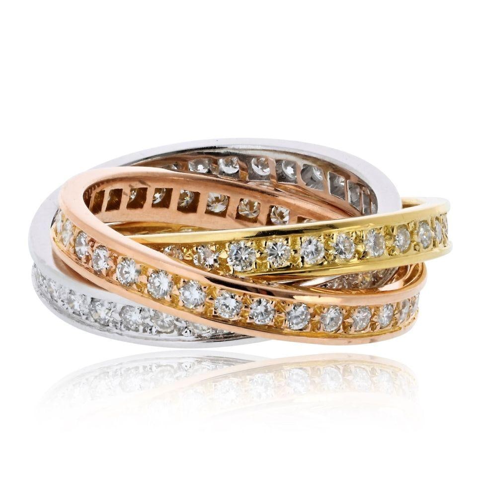Cartier Trinity 18K Tri Color Diamond Ring Size 7.5: Cartier Trinity 18K Tri Color Diamond Ring Size 7.5 This exquisite Cartier Trinity ring features a stunning tri-color design crafted from 18K gold. Weighing 11 grams, this elegant piece is adorned wit
