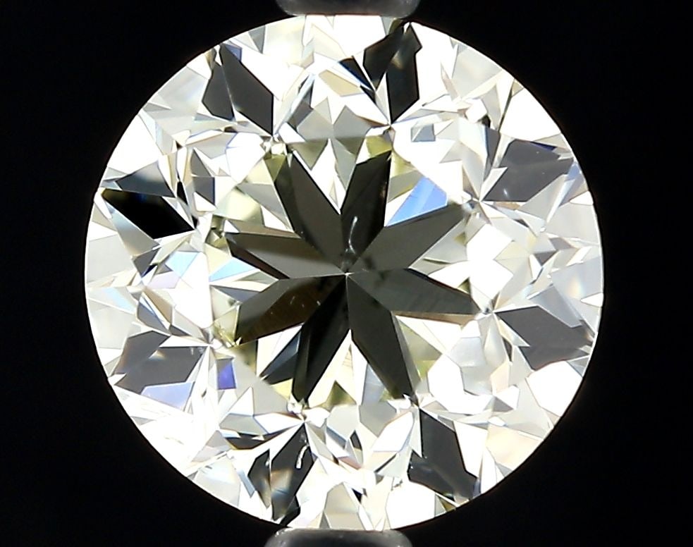 Loose Diamond - ROUND 1.54ct O-P SI1: Loose Diamond - ROUND 1.54ct O-P SI1 Source: Natural Shape: ROUND Carats: 1.54 Color: O-P Certification: GIA Video: