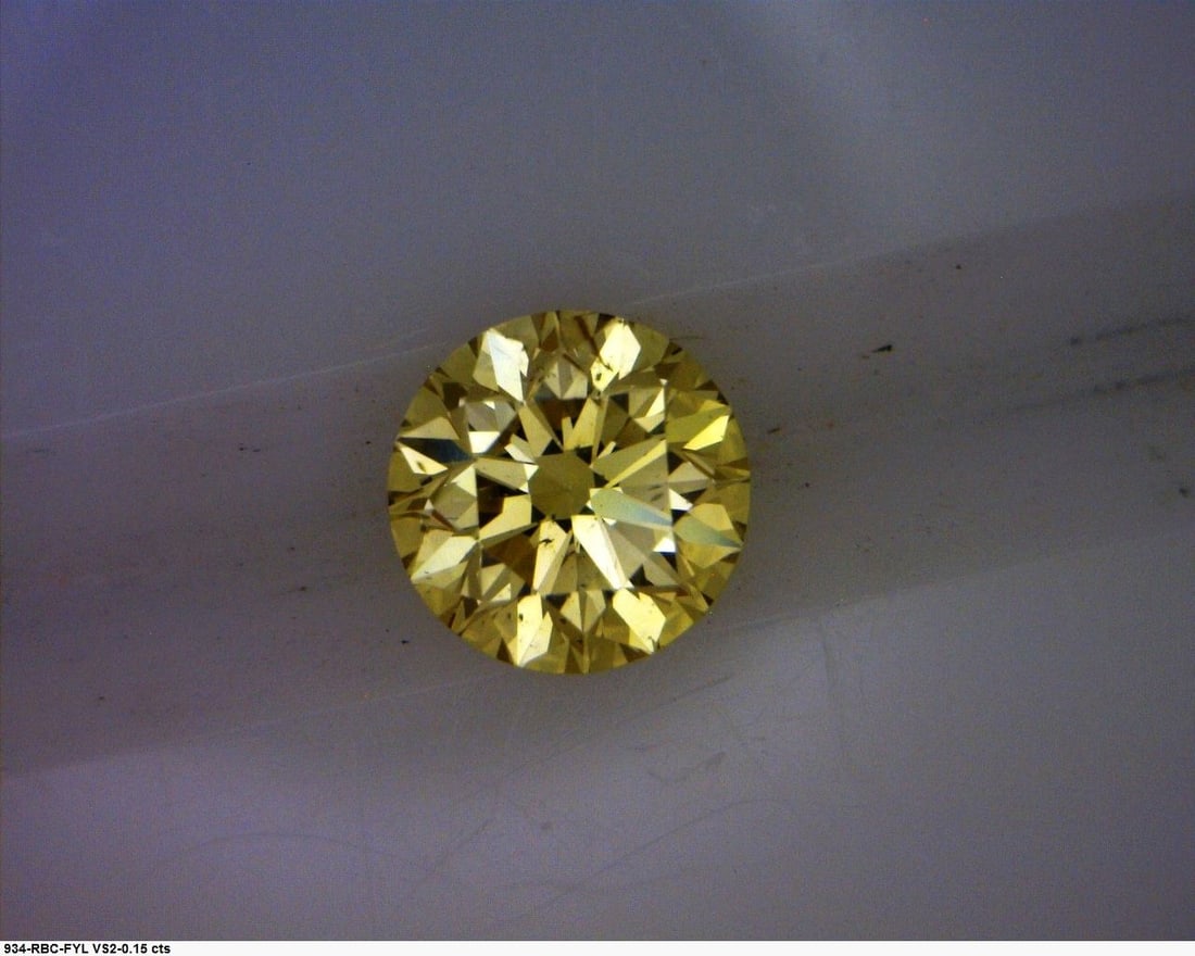 Loose Diamond - ROUND 0.15ct Fancy Yellow: Loose Diamond - ROUND 0.15ct Fancy Yellow Source: Natural Shape: ROUND Carats: 0.15 Color: Fancy Yellow Certification: GIA The Diamond Depot Guarantee: All items in this auction are guaranteed to be 1