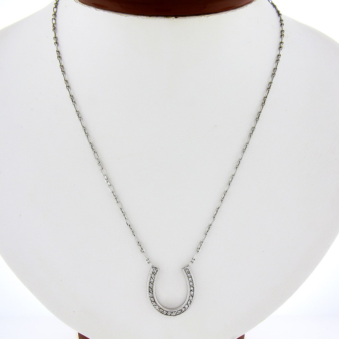 Italian 14k White Gold 0.24ctw Diamond Horseshoe Pendant Necklace: Italian 14k White Gold 0.24ctw Diamond Horseshoe Pendant Necklace This exquisite Italian pendant necklace is crafted from solid 14k white gold and features a charming lucky horseshoe design adorned wi