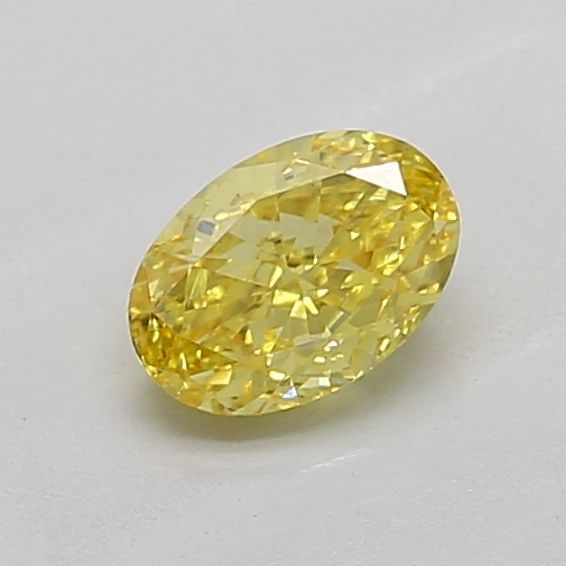 Loose Diamond - OVAL 0.77ct Fancy Vivid Yellow VS1: Loose Diamond - OVAL 0.77ct Fancy Vivid Yellow VS1 Source: This is a real non-mined Diamond that has been grown in a lab Shape: OVAL Carats: 0.77 Color: Fancy Vivid Yellow Certification: IGI Video: