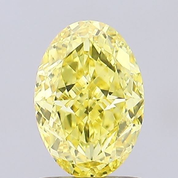 Loose Diamond - OVAL 1.35ct Fancy Vivid Yellow VVS2: Loose Diamond - OVAL 1.35ct Fancy Vivid Yellow VVS2 Source: This is a real non-mined Diamond that has been grown in a lab Shape: OVAL Carats: 1.35 Color: Fancy Vivid Yellow Certification: IGI Video: