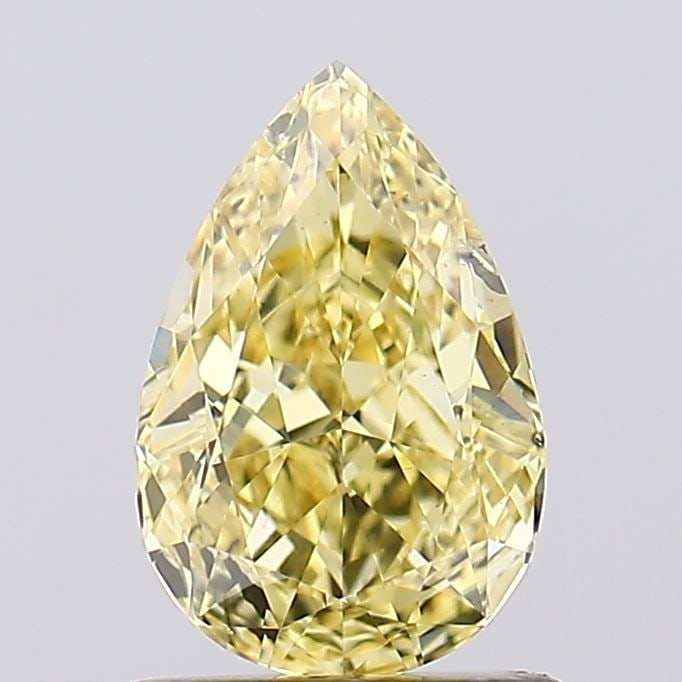 Loose Diamond - PEAR 1.01ct Fancy Vivid Yellow SI1: Loose Diamond - PEAR 1.01ct Fancy Vivid Yellow SI1 Source: This is a real non-mined Diamond that has been grown in a lab Shape: PEAR Carats: 1.01 Color: Fancy Vivid Yellow Certification: IGI Video: