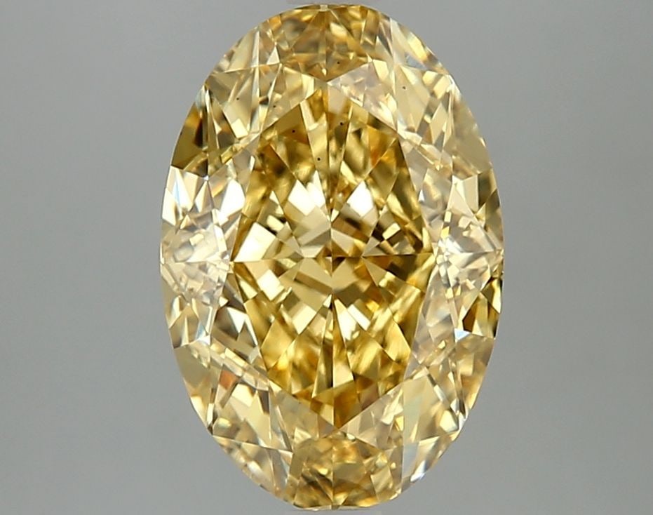 Loose Diamond - OVAL 4.09ct Fancy Vivid Yellow VS1: Loose Diamond - OVAL 4.09ct Fancy Vivid Yellow VS1 Source: This is a real non-mined Diamond that has been grown in a lab Shape: OVAL Carats: 4.09 Color: Fancy Vivid Yellow Certification: IGI Video: