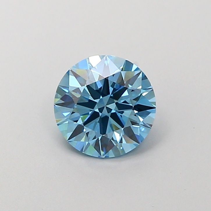 Ideal Loose Diamond - ROUND 1.04ct Fancy Vivid Blue VVS1: Ideal Loose Diamond - ROUND 1.04ct Fancy Vivid Blue VVS1 Source: This is a real non-mined Diamond that has been grown in a lab Shape: ROUND Carats: 1.04 Color: Fancy Vivid Blue Certification: IGI Vide