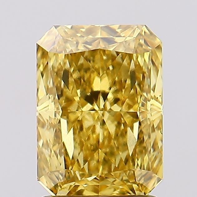 Loose Diamond - RADIANT 2.08ct Fancy Vivid Yellow VS1: Loose Diamond - RADIANT 2.08ct Fancy Vivid Yellow VS1 Source: This is a real non-mined Diamond that has been grown in a lab Shape: RADIANT Carats: 2.08 Color: Fancy Vivid Yellow Certification: IGI Vid