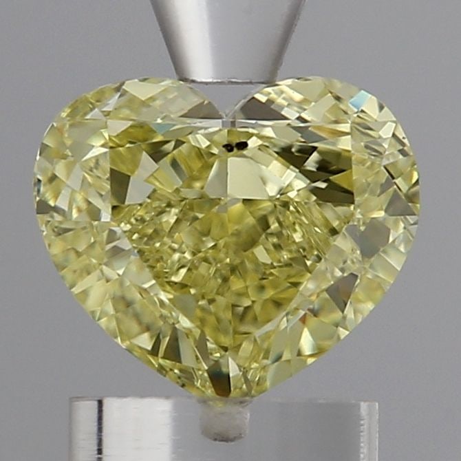 Loose Diamond - HEART 1.47ct Fancy Intense Yellow SI1: Loose Diamond - HEART 1.47ct Fancy Intense Yellow SI1 Source: This is a real non-mined Diamond that has been grown in a lab Shape: HEART Carats: 1.47 Color: Fancy Intense Yellow Certification: IGI Vid