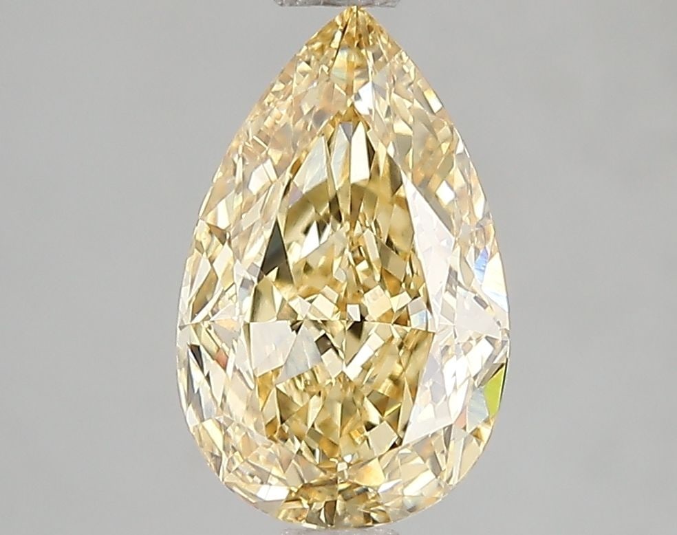 Loose Diamond - PEAR 2.06ct Fancy Vivid Yellow VS2: Loose Diamond - PEAR 2.06ct Fancy Vivid Yellow VS2 Source: This is a real non-mined Diamond that has been grown in a lab Shape: PEAR Carats: 2.06 Color: Fancy Vivid Yellow Certification: IGI Video: